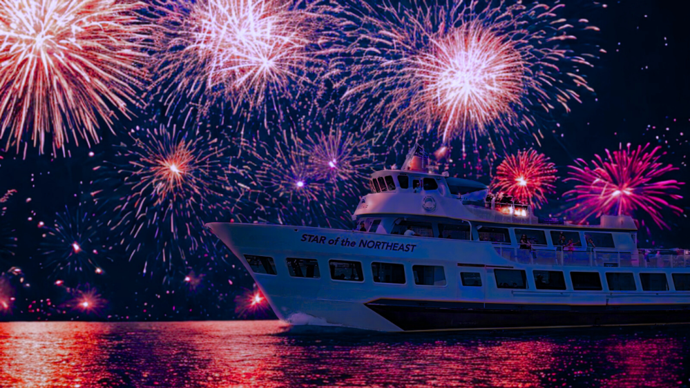 fireworks in the night sky over a body of water